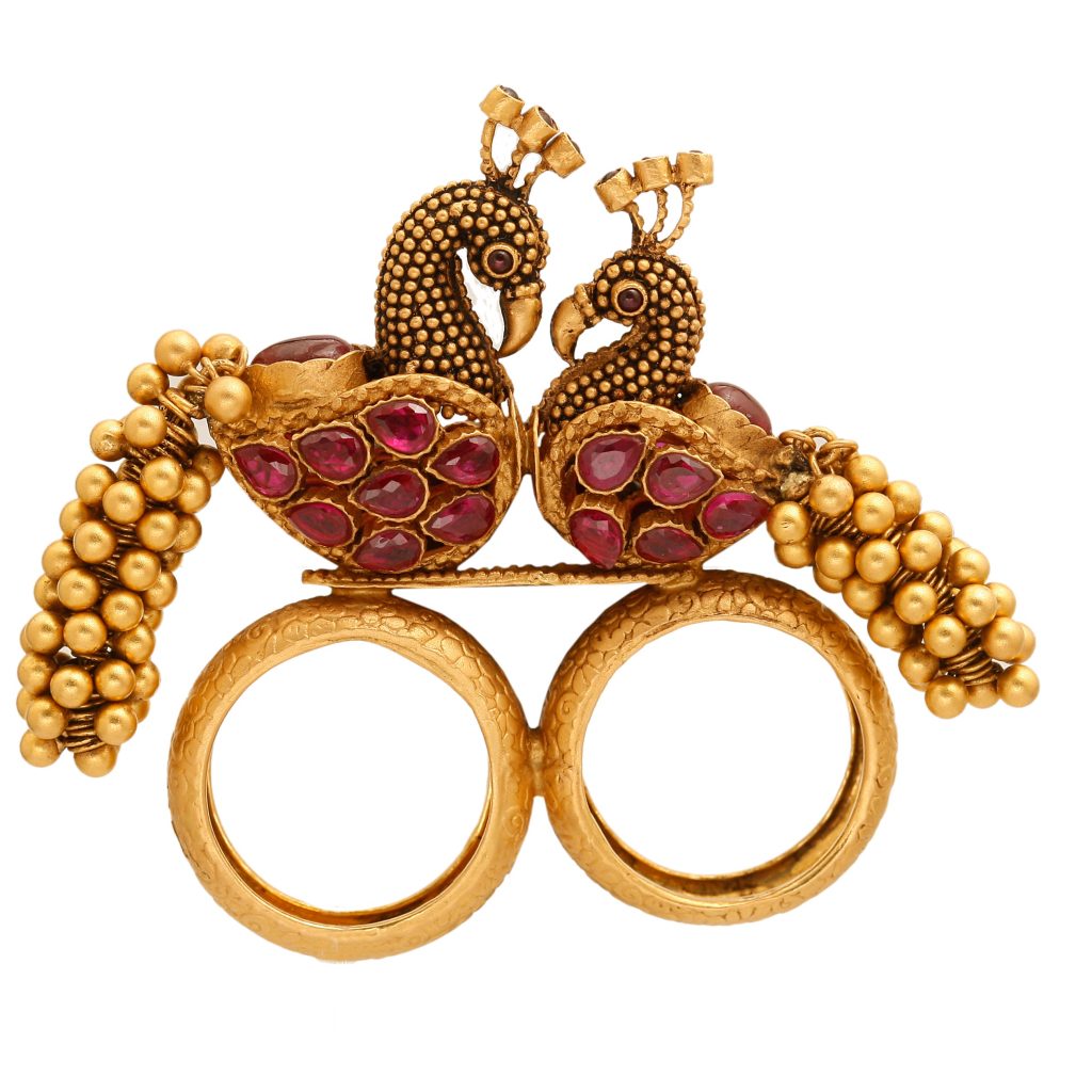 Dual finger Temple ring by ANMOL with intricate carvings of peacock