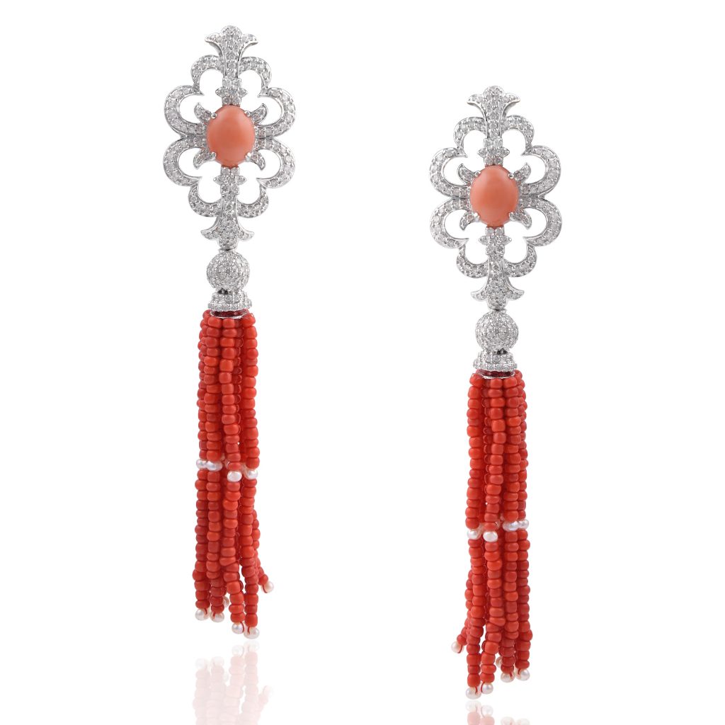 Saffron tassel earrings by RK Jewellers South Extension 2