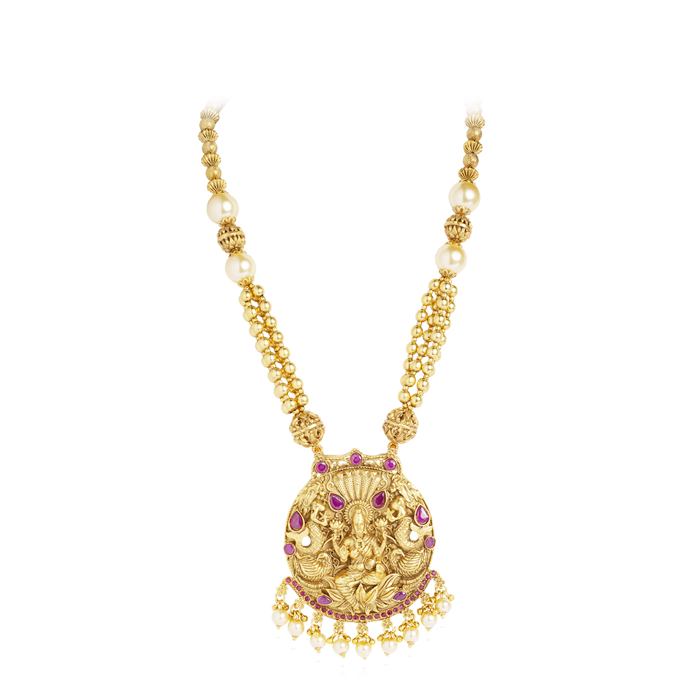 Gold plated temple necklace featuring goddess with ruby beads and white pearls