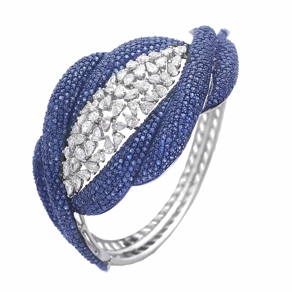 Cuff by ANMOL crafted in 18 K gold and set with blue sapphires and diamonds (1)
