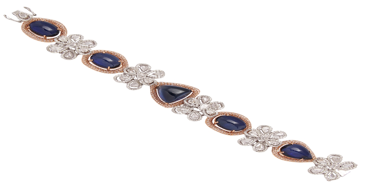 Bracelet by ANMOL crafted in 18 K gold and set with coloured gemstones, rosecut diamonds and round brilliant diamonds