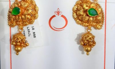 Manufacturers display diverse display of gold temple earrings at IIJS