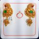 Manufacturers display diverse display of gold temple earrings at IIJS