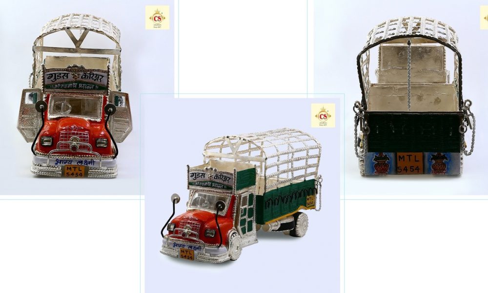 Chandukaka Saraf and Sons immortalizes transporter's success with silver miniature truck