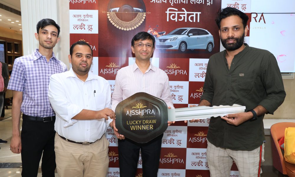 Mr. Maneesh Singh Hero bike winner of the Akshaya Tritiya Lucky draw contest held by Aisshpra Gems Jewels