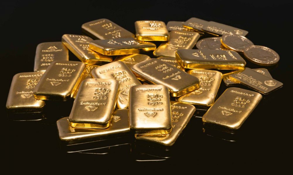 India raises base import price of gold