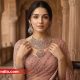 Bride wearing closed setting diamond necklace and earrings by Laxmi Diamonds Bengaluru in a heritage setting.