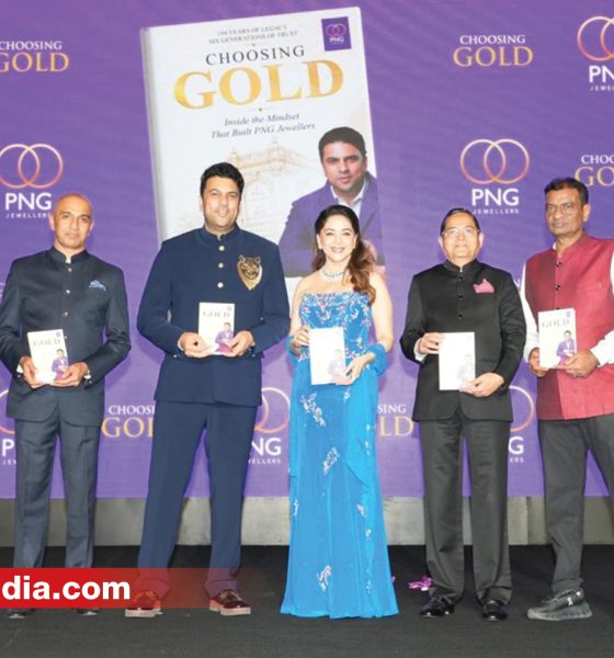 PNG Jewellers CMD Saurabh Gadgil launches his memoir Choosing Gold at a Mumbai event with Madhuri Dixit.