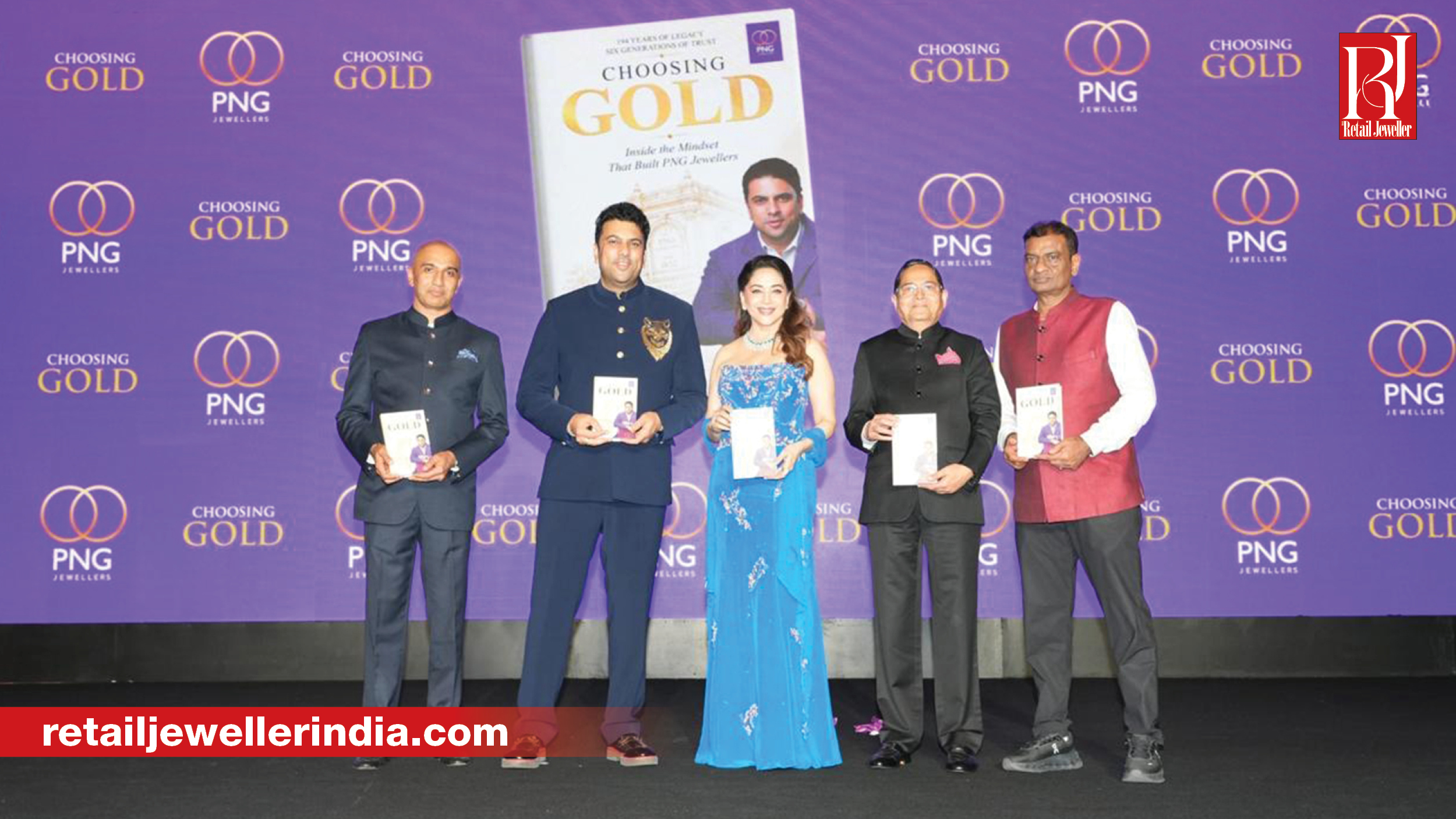 PNG Jewellers CMD Saurabh Gadgil launches his memoir Choosing Gold at a Mumbai event with Madhuri Dixit.