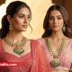 Two models wearing temple-inspired 22kt gold bridal necklaces by S K Seth Jewellers against a heritage backdrop